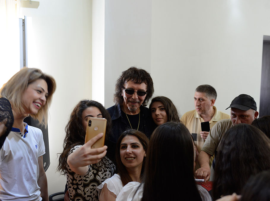 Tony Iommi with the children 