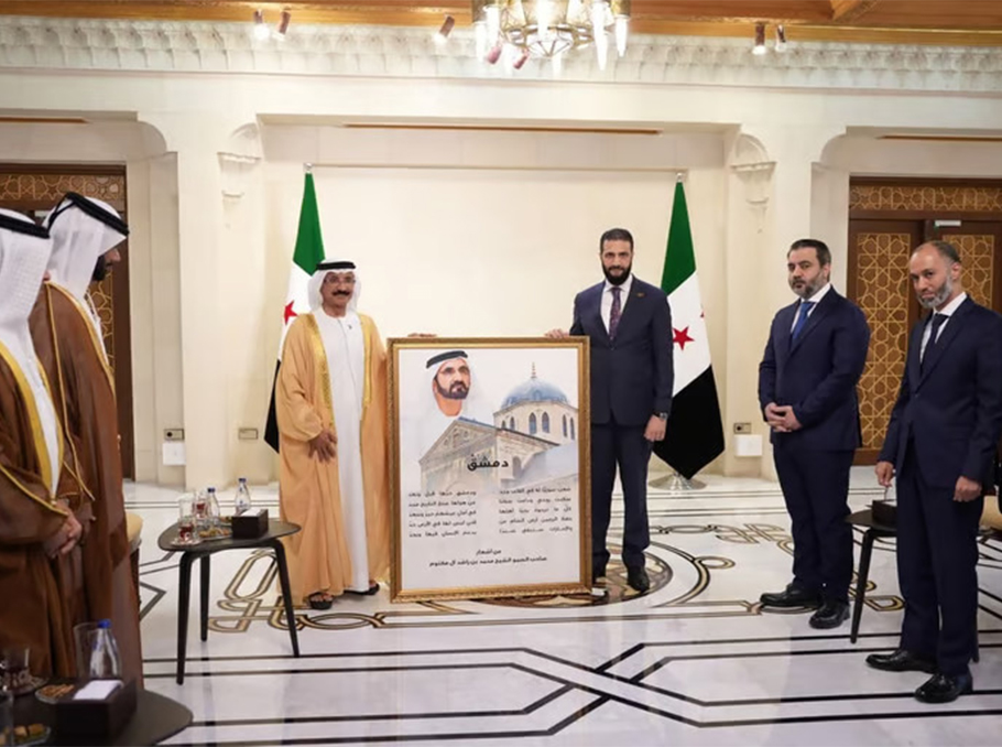 Sultan Ahmed bin Sulayem and Syria’s President Ahmed Al-Sharaa after signing the agreement