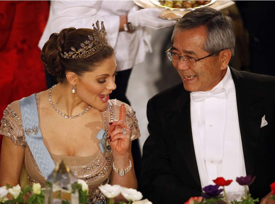 Sweden's Crown Princess Victoria and Japanese scientist Ei-ichi Negishi, winner of the 2010 Nobel Prize in Chemistry discuss during the Nobel Banquet in Stockholm's City Hall